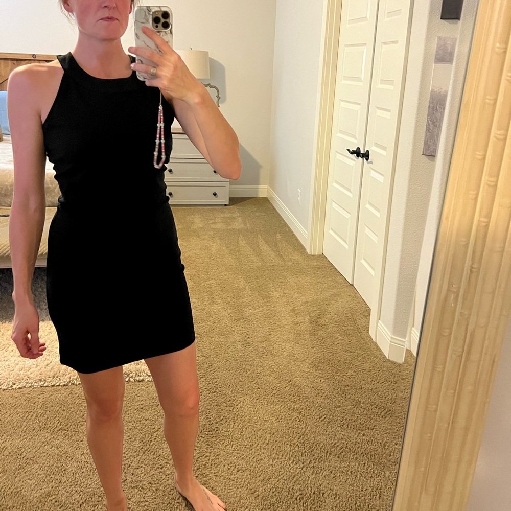 Black size M fitted mini dress